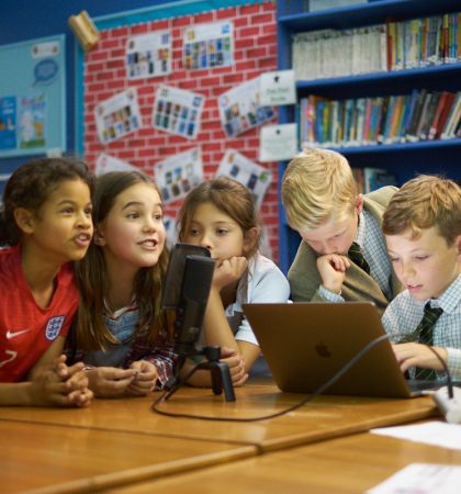 Group of children with computer